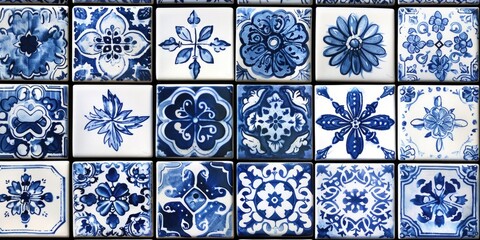 A bunch of blue and white tiles on a wall. Suitable for interior design projects