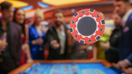 Multiethnic Young Adults Playing an Engaging Game of Roulette, Spending a Fun Evening in a...