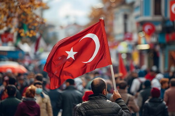 waving turkish flag in a crowd on street