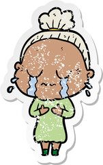 distressed sticker of a cartoon crying old lady