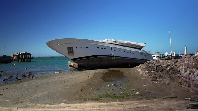 Large beached yacht after Hurricane Norma, October 2023 in La Paz, Baja California Sur, Mexico.