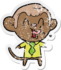 distressed sticker of a crazy cartoon business monkey