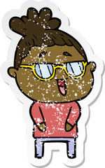 distressed sticker of a cartoon happy woman wearing spectacles