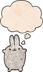 cartoon rabbit with thought bubble in grunge texture style