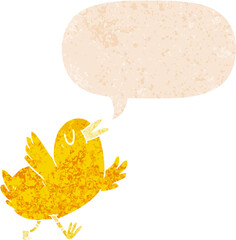 cartoon happy bird with speech bubble in grunge distressed retro textured style