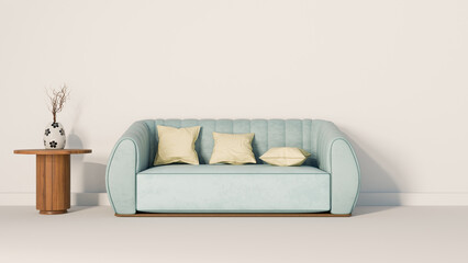 a blue couch with two pillows and a table