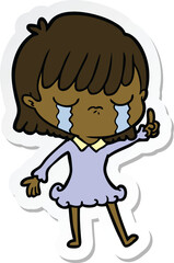 sticker of a cartoon woman crying