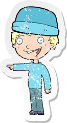 retro distressed sticker of a cartoon man wearing winter hat