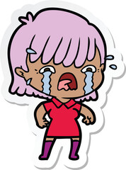 sticker of a cartoon girl crying
