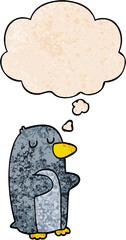 cartoon penguin with thought bubble in grunge texture style