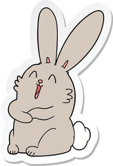 sticker of a cartoon laughing bunny rabbit