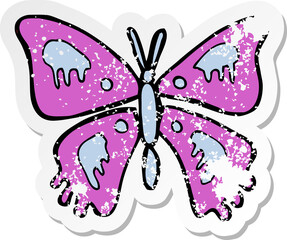 retro distressed sticker of a cartoon butterfly