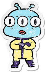 distressed sticker of a cartoon three eyed alien