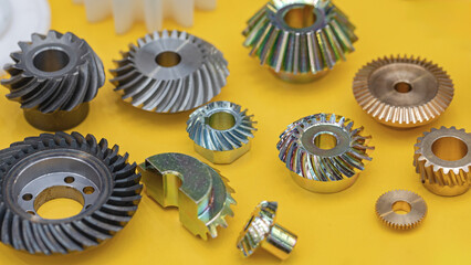 Various Size and Shape Sprocket Wheels Metal Spare Parts for Machines - obrazy, fototapety, plakaty