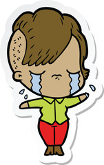 sticker of a cartoon crying girl