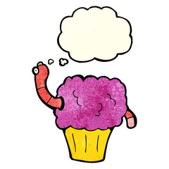 cartoon worm in cupcake with thought bubble