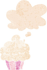 cartoon cupcake with thought bubble in grunge distressed retro textured style