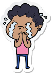 sticker of a cartoon man crying