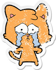 distressed sticker of a cartoon crying cat