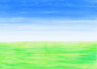 緑の草原と青空水彩画