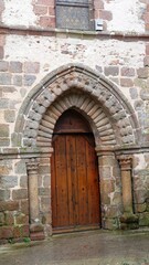 Fototapeta na wymiar Porte de la basilique d'Evron dans la Mayenne France Europe