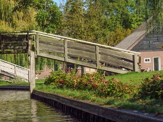 Beautiful view of the bridge over the canal in Giethoorn village, Netherlands