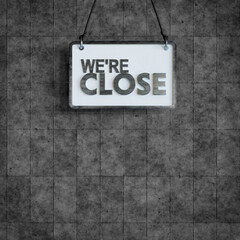 store close sign 3d rendered. modern signage on wall background, metal text on white board