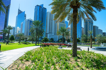 Abu Dhabi, Arab Emirates. Modern urban architecture of the business part of the city. Dominated by high-rise buildings. An example of urban greening, landscaping of cities