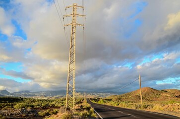 Obraz premium Road passing through the landscape under the cloudy sky in Tenerife Canary Islands