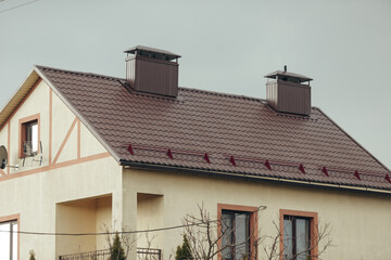Private residential building with metal roofing and snow guards