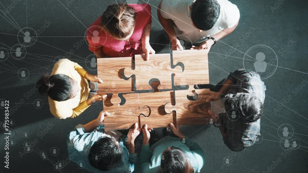 Poster top down view of business people gathering jigsaw together at meeting. aerial view of diverse team c