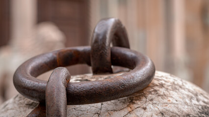Selective focus shot of a rusty chain