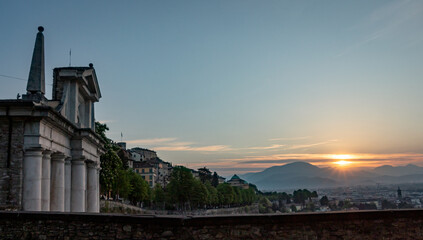 Historical Porta San Giacomo at sunset in Bergamo, Italy