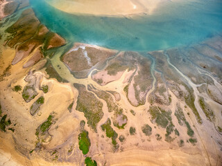 Aerial view of Bonhome beach in estuary of Villaviciosa.