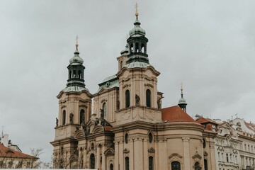 Fototapeta na wymiar Historic buildings on a cloudy day in Prague, Czech Republic