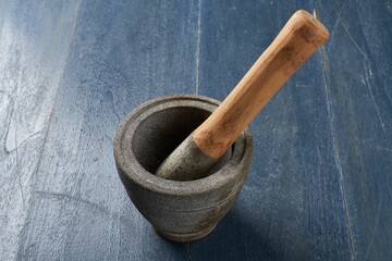 Stone and wood cooking utensil used to grind spices