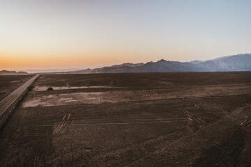 sunset over the Nazca lines in the desert in Peru