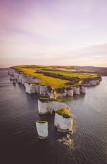 Aerial view of Old Harry Rocks of England's Jurassic Coasts in the United Kingdom - obrazy, fototapety, plakaty