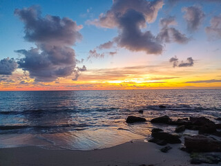Naklejka na ściany i meble Sunrise in a Caribbean sea