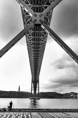 Low angle shot of the 25 de Abril Bridge in Lisbon, Portugal