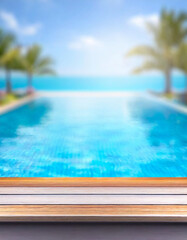 empty wooden table top and blurred swimming pool in tropical resort with blurred background.