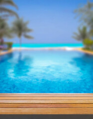 empty wooden table top and blurred swimming pool in tropical resort with blurred background.