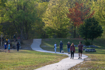 People walking along the trail on an autumn day