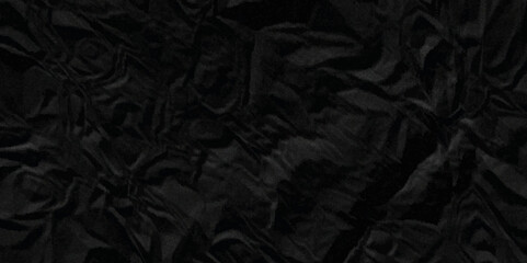 Dark black crumpled paper texture background. black crumpled and top view textures can be used for background of text or any contents.