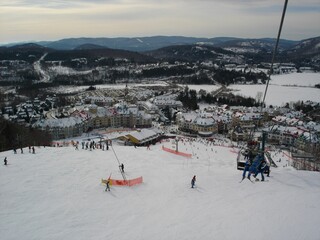 Aerial view of people skiing on Mont Saint Sauveur in Quebec, Canada