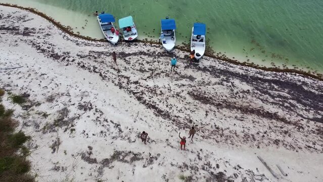 Aerial view of boats moored on the shore of Sian Kaan, Mexico