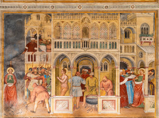 Religious fresco showing a scene with christian saints in a medieval european city
