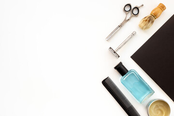 Flat lay with shaving accessories and cosmetic beauty products for men