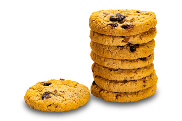 Stack of homemade circular oat flakes and cranberry biscuits isolated on white background with clipping path.