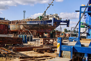 rusty ship hull in a repair dock